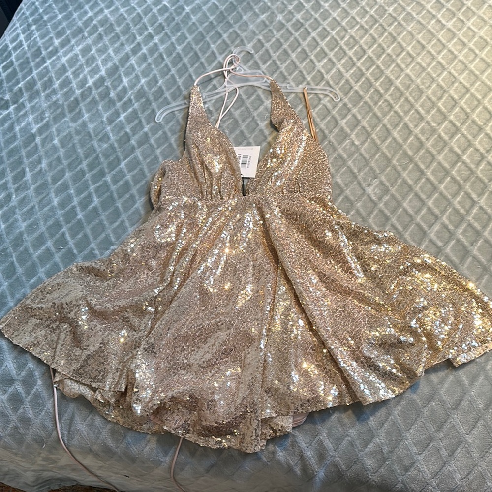 NWT. Gold sequin dress. US size 6